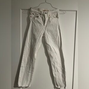 Levi’s wedgie straight white jeans.